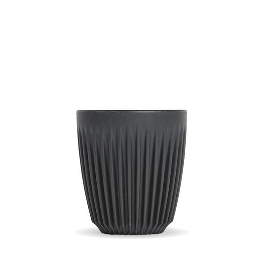 8oz Charcoal Huskee reusable coffee cup|Pack of 4, 8oz Charcoal Huskee reusable coffee cups stacked in front of packaging box