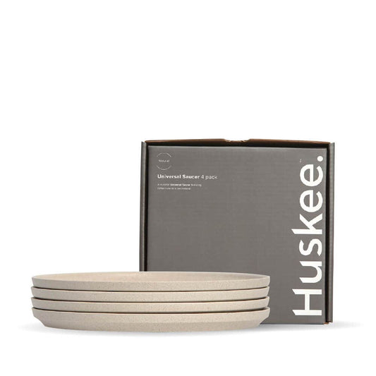 4-pack of Natural HuskeeCup Classic Saucers in front of packaging box