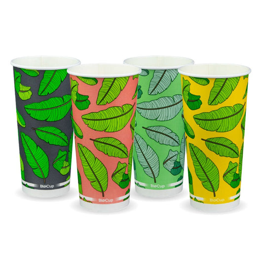 |paper cold cups with leaf print design in pink, green and yellow colors covered with PLA clear lid and paper straws